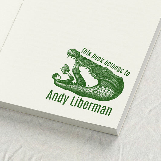Man Reading in Crocodile Library Stamp
