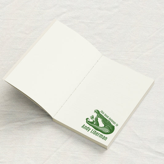 Man Reading in Crocodile Library Stamp