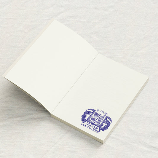 Book with Twin Faces Library Stamp