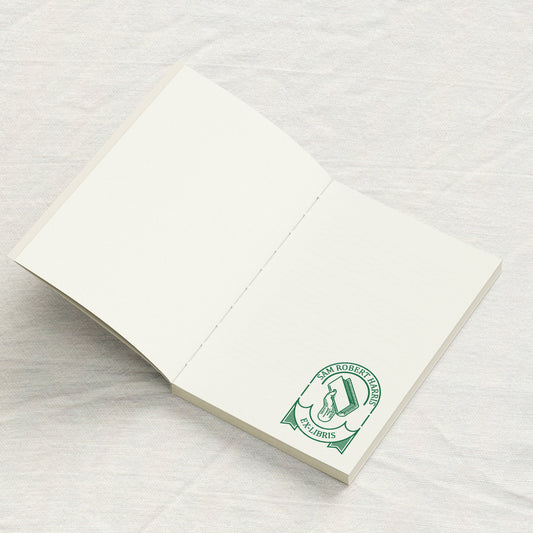 Hand Holding Book Library Stamp